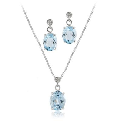 Sterling Silver 6&1/2ct Blue Topaz & Diamond Accent Oval Pendant Earring Set
