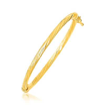 14k Yellow Gold Childrens Bangle with Spiral Motif Style